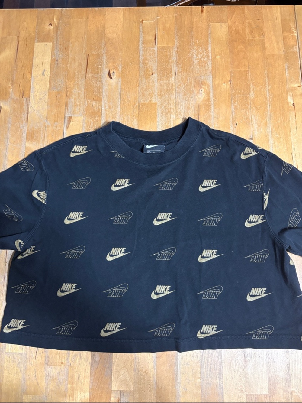 Nike Black Cropped Tee with Gold Allover Logos